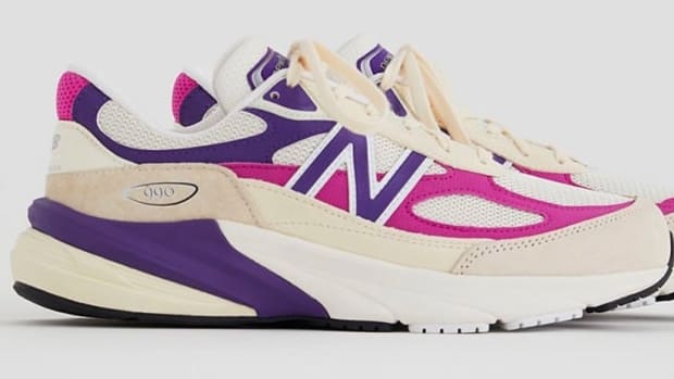 Side view of cream, pink, and purple New Balance shoes.
